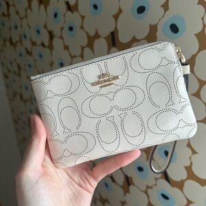 Coach Off-White Perforated Wristlet